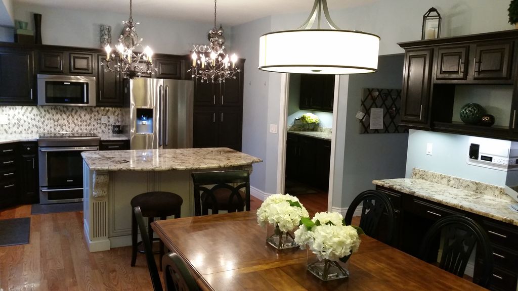A Spacious Kitchen Calls for a Crystal Chandelier